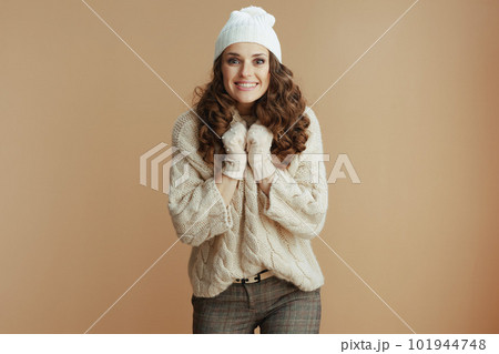 excited modern female isolated on beige background excited modern female isolated on beige background 101944748