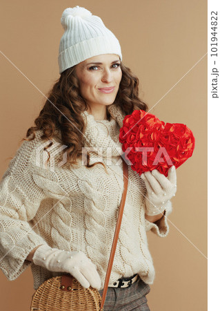 happy stylish woman isolated on beige background happy stylish woman isolated on beige background 101944822