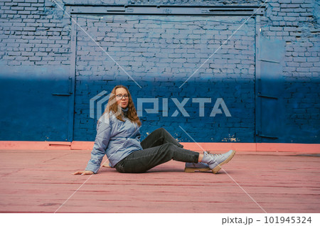 Portrait of a stylish woman in blue jacket Portrait of a stylish woman in blue jacket 101945324