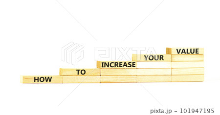 Increase your value symbol. Concept words How to increase your value on wooden blocks. Beautiful white table white background. Business how to increase your value concept. Copy space. 101947195