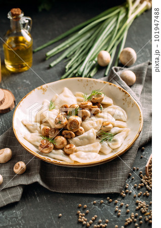 Russian dumplings vareniki with mushroom filling 101947488