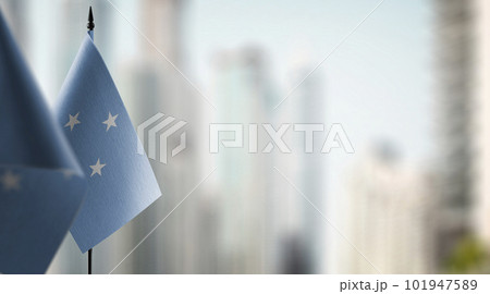 Small flags of the Federated States Micronesia on an abstract blurry background Small flags of the Federated States Micronesia on an abstract blurry background 101947589