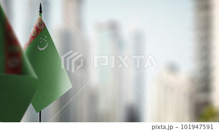 Small flags of the Turkmenistan on an abstract blurry background Small flags of the Turkmenistan on an abstract blurry background 101947591