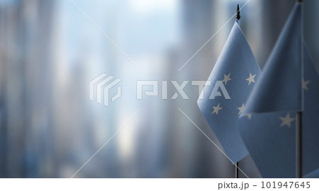 Small flags of the Federated States Micronesia on an abstract blurry background Small flags of the Federated States Micronesia on an abstract blurry background 101947645