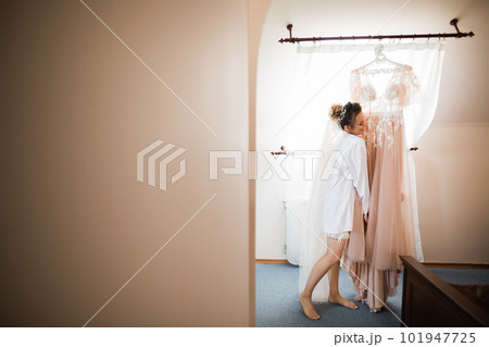 Portrait of beautiful bride with fashion veil at wedding morning Portrait of beautiful bride with fashion veil at wedding morning 101947725