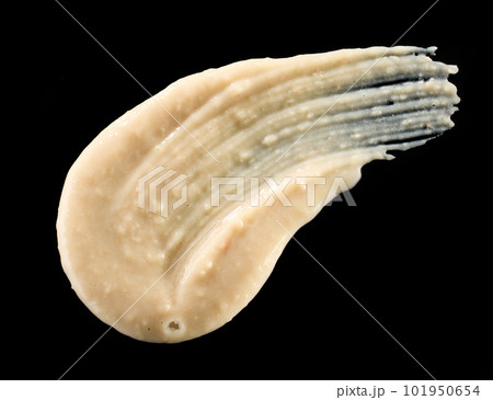 hummus on black background 101950654