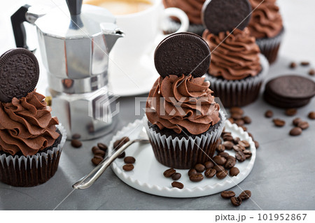 Chocolate coffee cupcakes with dark frosting 101952867
