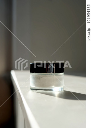 Closed jar of scrub-powder for the face. 101954586