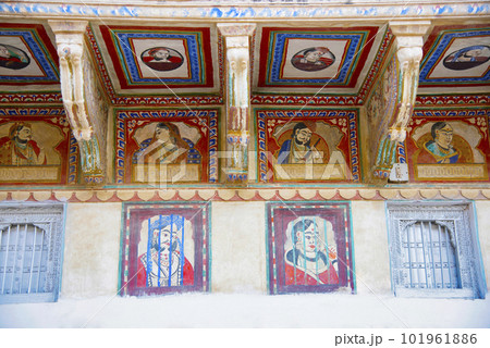 Colorful paintings on the outer wall of an old haveli in Shekhawati, located in Nawalgarh, Rajasthan, India Colorful paintings on the outer wall of an old haveli in Shekhawati, located in Nawalgarh, Rajasthan, India 101961886