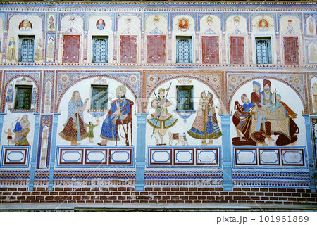 Colorful paintings on the outer wall of Dr. Ramnath Podar Haveli Museum richly decorated with painted murals, located in Nawalgarh, Rajasthan, India 101961889