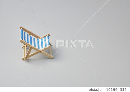 blue striped beach chair on isolated white background blue striped beach chair on isolated white background 101964335