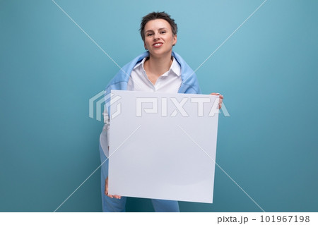 freelance business concept. young woman holding paper poster mockup freelance business concept. young woman holding paper poster mockup 101967198