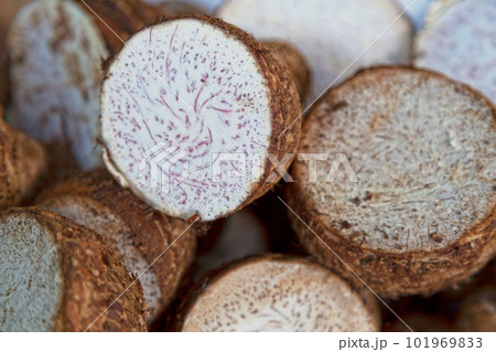 Stack of taro on a market stall 101969833