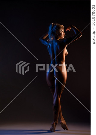 Naked woman in neon light 101970003