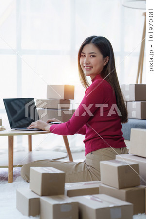 Small businesses SME owners female entrepreneurs check online orders to prepare to pack the boxes, sell to customers, sme business ideas online 101970081