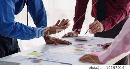 Group of Businessman or Accountant checking finance data document for investigation of corruption account. Anti Bribery concept Group of Businessman or Accountant checking finance data document for investigation of corruption account. Anti Bribery concept 101970144