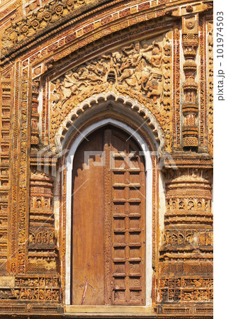 Closed Door and War Scenes Depicting on the Wall of Char Bangla Temple, Jiaganj, West Bengal, India. Closed Door and War Scenes Depicting on the Wall of Char Bangla Temple, Jiaganj, West Bengal, India. 101974503