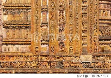 Carvings of war Scenes and human Life on the Char Bangla Temple, Jiaganj, West Bengal, India. 101974504