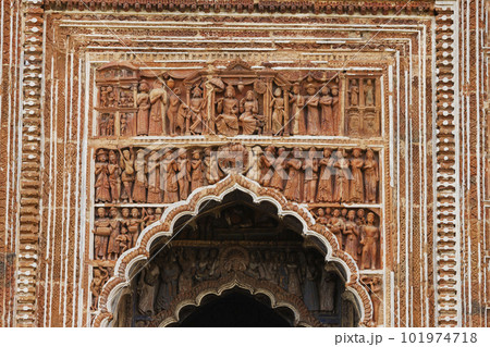 King and Queen with attendants carving on the entrance of Pratapeshwara Temple, Kalna, West Bengal, India. 101974718