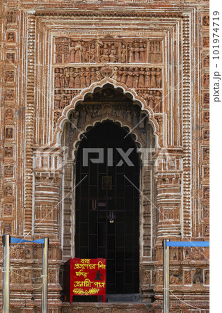 Carved entrance door of Pratapeshwara Temple, Kalna, West Bengal, India. Carved entrance door of Pratapeshwara Temple, Kalna, West Bengal, India. 101974719