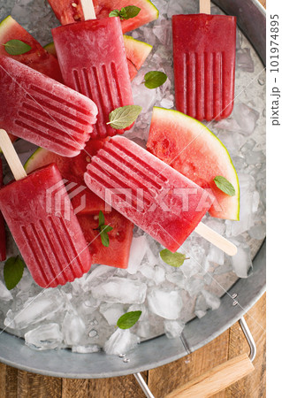 Watermelon and strawberry popsicles Watermelon and strawberry popsicles 101974895