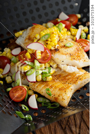 Grilled cod with summer vegetables Grilled cod with summer vegetables 101975594