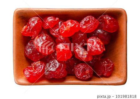 Dried cherries in clay bowl isolated on white flat lay view Dried cherries in clay bowl isolated on white flat lay view 101981818