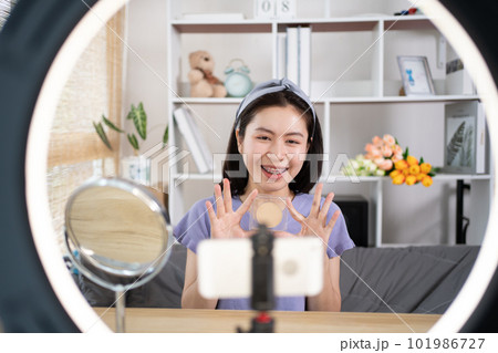 Beautiful women with social media influences recommend products and make-up accessories to be more beautiful, Recording vlog video live streaming, Online business of beauty bloggers. Beautiful women with social media influences recommend products and make-up accessories to be more beautiful, Recording vlog video live streaming, Online business of beauty bloggers. 101986727