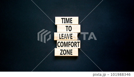 Leave comfort zone symbol. Concept words Time to leave comfort zone on wooden blocks. Beautiful black table black background. Business time to leave comfort zone concept. Copy space. 101988346