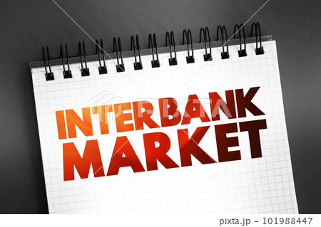Interbank Market - top-level foreign exchange market where banks exchange different currencies, text on notepad Interbank Market - top-level foreign exchange market where banks exchange different currencies, text on notepad 101988447