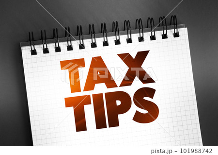 Tax Tips text on notepad, business concept background 101988742