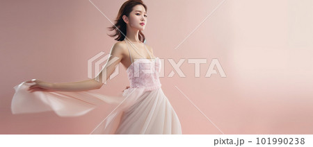 Asian woman with a beautiful face against light pink background - full body studio shot - made with 101990238
