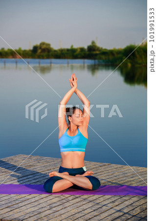 girl doing yoga exercise girl doing yoga exercise 101991533