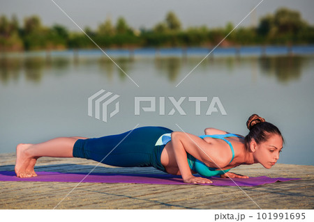girl doing yoga exercise girl doing yoga exercise 101991695