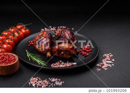 Delicious grilled chicken legs with spices and herbs in teriyaki sauce 101993206