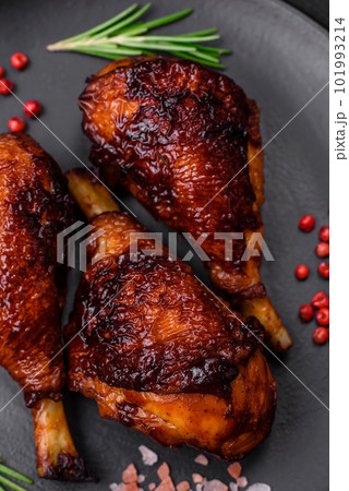 Delicious grilled chicken legs with spices and herbs in teriyaki sauce Delicious grilled chicken legs with spices and herbs in teriyaki sauce 101993214