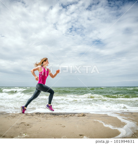 Woman legs in a swimming pool. 101994631