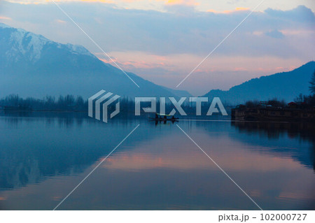 Shikara on the lake at dusk 102000727