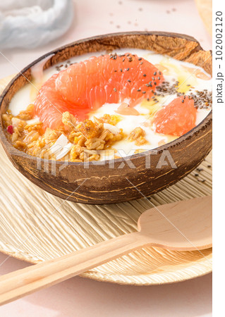 Yogurt with grapefruit, granola, chia and honey Yogurt with grapefruit, granola, chia and honey 102002120