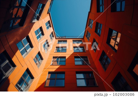 Low angle shot of a unique high rise orange...のイラスト素材 [102003086] - PIXTA