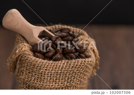 Coffee grains in a bag Coffee grains in a bag 102007306