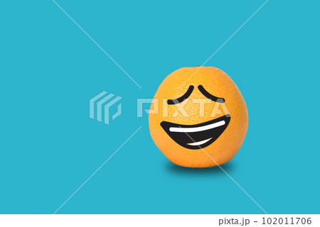 Orange face funny on blue background. Clipping path Orange face funny on blue background. Clipping path 102011706