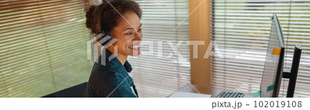 Woman designer works in home office drawing on graphic tablet. Freelancer working on project 102019108