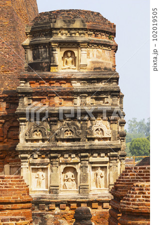 Carvings of Lord Budhha on the Ruin of Nalanda University, Rajgir, Nalanda, Bihar.. 102019505