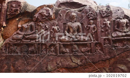 Carving sculptures of Jain Saints on the Wall of Sone Bhandar Caves, Rajgir, Nalanda, Bihar Carving sculptures of Jain Saints on the Wall of Sone Bhandar Caves, Rajgir, Nalanda, Bihar 102019702