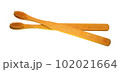 a wooden-handled toothbrush 102021664