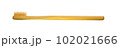 a wooden-handled toothbrush 102021666
