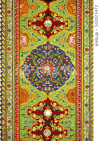 Colourful paintings on the ceiling of an entrance gate of Raghu Nath Ji Mandir, dedicated to Lord Rama and Sita, located in Mandawa, Shekhawati, Rajasthan, India Colourful paintings on the ceiling of an entrance gate of Raghu Nath Ji Mandir, dedicated to Lord Rama and Sita, located in Mandawa, Shekhawati, Rajasthan, India 102023472