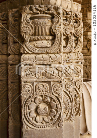 Carved stone pillars displayed in the corridor of Chand Baori, a deep four-sided stepwell. It extends 30m (100ft) into the ground, making it one of the deepest and largest stepwells in India. 102024116
