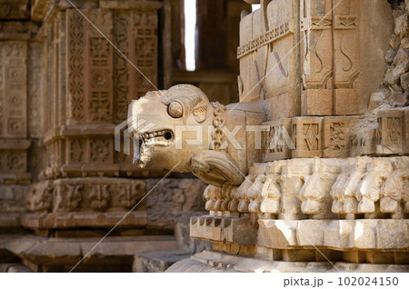 Gargoyle carved in sandstone, on the outer wall of Gopinath Mandir, situated in the Bhangarh Fort complex, is a 16th-century fort built in 1573, Alwar district, Rajasthan, India Gargoyle carved in sandstone, on the outer wall of Gopinath Mandir, situated in the Bhangarh Fort complex, is a 16th-century fort built in 1573, Alwar district, Rajasthan, India 102024150